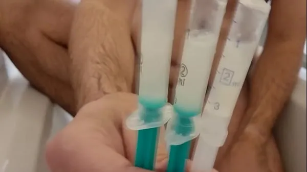 New injecting sperm from a strange guy into my peehole with syringe that he send me via express shipping top Clips